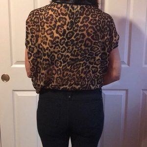 Size Small, slightly sheer cheetah print back top